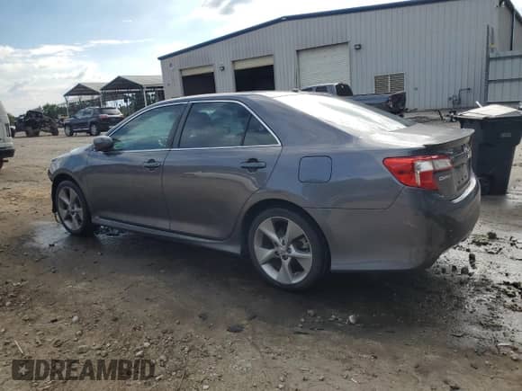 2014 Toyota Camry SE with VIN 4T1BK1FK5EU545429, listed as a Copart auction lot 83930235 with 177,384 mi miles and Salvage title. Bid and sale history available at DreamBid. Image 2.