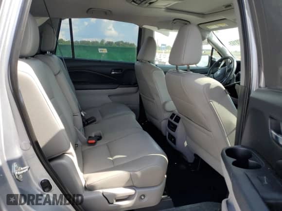 2018 Honda Pilot Touring с VIN 5FNYF5H9XJB000303, выставлен на аукционе Copart как лот 66020165 с пробегом 125 689 миль миль и Списание • Salvage title. История ставок и продаж доступна на DreamBid. Изображение 11.