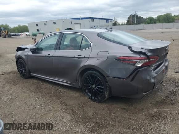 2023 Toyota Camry Hybrid XSE с VIN 4T1K31AK6PU048011, выставлен на аукционе Copart как лот 53983115 с пробегом 195 772 миль миль и Списание • Salvage title. История ставок и продаж доступна на DreamBid. Изображение 2.
