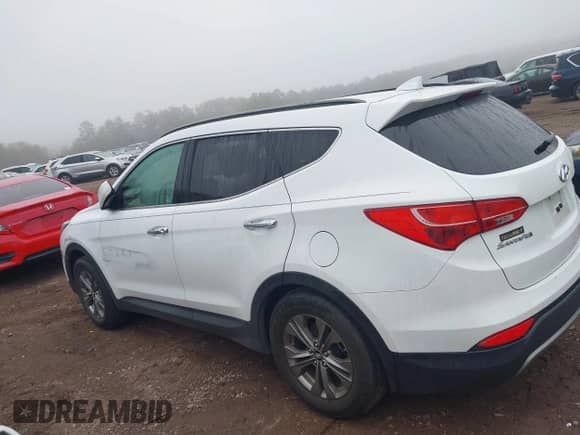 2014 Hyundai Santa Fe с VIN 5XYZU3LB1EG135810, выставлен на аукционе IAAI как лот 43312775 с пробегом 99 730 миль миль и . История ставок и продаж доступна на DreamBid. Изображение 14.
