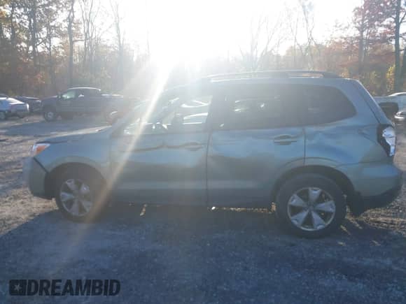 2014 Subaru Forester Premium z VIN JF2SJAECXEH550055, wystawiony jako IAAI lot #43546226 z przebiegiem 200 238 mil mil oraz . Historia ofert i sprzedaży dostępna na DreamBid. Obrazek 14.