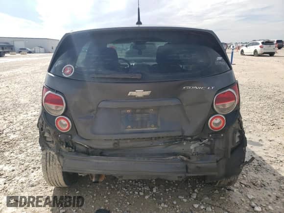 2012 Chevrolet Sonic LT z VIN 1G1JD6SH4C4231312, wystawiony jako Copart lot #43200445 z przebiegiem 94 655 mil mil oraz Szkoda całkowita • Salvage title. Historia ofert i sprzedaży dostępna na DreamBid. Obrazek 6.