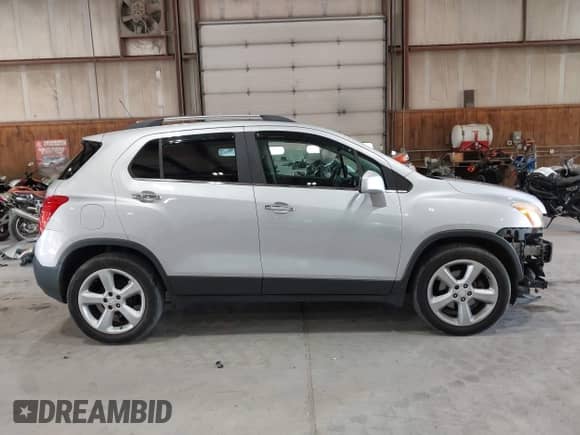2015 Chevrolet Trax LTZ with VIN 3GNCJNSB6FL175233, listed as a IAAI auction lot 43152481 with 116,822 mi miles and . Bid and sale history available at DreamBid. Image 14.