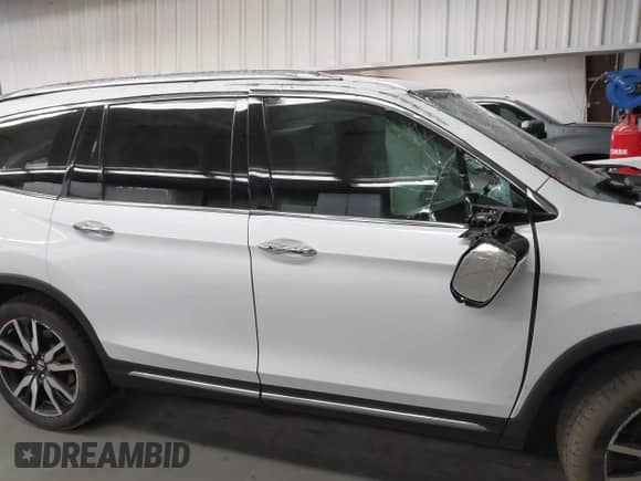 2020 Honda Pilot Touring 8-Passenger с VIN 5FNYF5H92LB014473, выставлен на аукционе IAAI как лот 42711125 с пробегом 50 117 миль миль и . История ставок и продаж доступна на DreamBid. Изображение 13.
