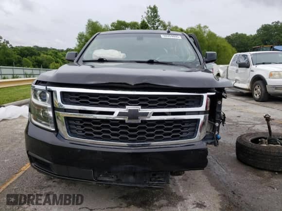 2016 Chevrolet Tahoe LS z VIN 1GNSKAKC1GR281982, wystawiony jako Copart lot #60359095 z przebiegiem Nie podano mil oraz Szkoda całkowita • Salvage title. Historia ofert i sprzedaży dostępna na DreamBid. Obrazek 5.