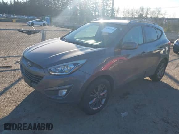2014 Hyundai Tucson Walking Dead Edition z VIN KM8JUCAG1EU808097, wystawiony jako IAAI lot #41436214 z przebiegiem 114 198 mil mil oraz . Historia ofert i sprzedaży dostępna na DreamBid. Obrazek 2.