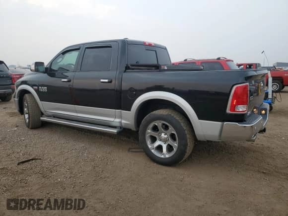 2014 Ram 1500 Laramie with VIN 1C6RR7NT4ES272420, listed as a Copart auction lot 69492355 with 82,635 mi miles and Clean title. Bid and sale history available at DreamBid. Image 2.