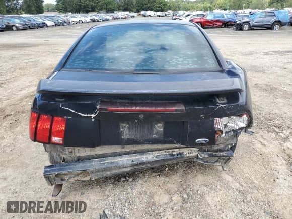 2002 Ford Mustang Standard with VIN 1FAFP40442F218397, listed as a Copart auction lot 82153245 with 183,356 mi miles and Salvage title. Bid and sale history available at DreamBid. Image 6.