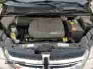 2013 Dodge Grand Caravan SE z VIN 2C4RDGBG9DR771972, wystawiony jako Copart lot #72099355 z przebiegiem 158 603 mil mil oraz Szkoda całkowita • Salvage title. Historia ofert i sprzedaży dostępna na DreamBid. Obrazek 11.