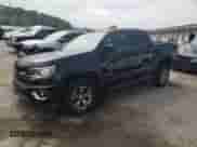 2019 Chevrolet Colorado 2WD Z71 with VIN 1GCGSDEA8K1169553, listed as a Copart auction lot 71304044 with 75,586 mi miles and Salvage title. Bid and sale history available at DreamBid. Image 1.