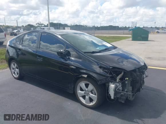 2013 Toyota Prius One z VIN JTDKN3DU8D5624288, wystawiony jako IAAI lot #42581790 z przebiegiem 190 555 mil mil oraz . Historia ofert i sprzedaży dostępna na DreamBid. Obrazek 1.