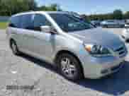 2007 Honda Odyssey EX-L z VIN 5FNRL38647B037010, wystawiony jako Copart lot #71994985 z przebiegiem 200 087 mil mil oraz Szkoda całkowita • Salvage title. Historia ofert i sprzedaży dostępna na DreamBid. Obrazek 4.