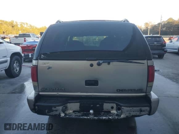 2000 Chevrolet Blazer LS z VIN 1GNCS13W8Y2271750, wystawiony jako Copart lot #41564865 z przebiegiem Nie podano mil oraz Szkoda całkowita • Salvage title. Historia ofert i sprzedaży dostępna na DreamBid. Obrazek 6.