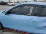 2019 Hyundai Veloster N z VIN KMHT36AHXKU002759, wystawiony jako Copart lot #71828823 z przebiegiem 30 778 mil mil oraz . Historia ofert i sprzedaży dostępna na DreamBid. Obrazek 7.