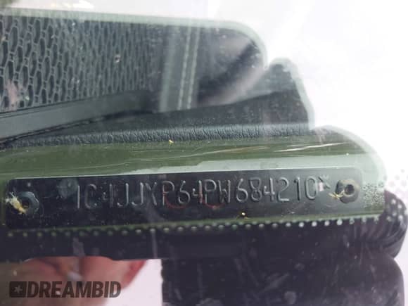 2023 Jeep Wrangler Sahara with VIN 1C4JJXP64PW684210, listed as a IAAI auction lot 42244388 with 23,622 mi miles and . Bid and sale history available at DreamBid. Image 17.