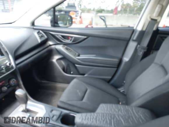 2018 Subaru Impreza with VIN 4S3GTAA65J3701017, listed as a IAAI auction lot 42827533 with 109,708 mi miles and . Bid and sale history available at DreamBid. Image 5.