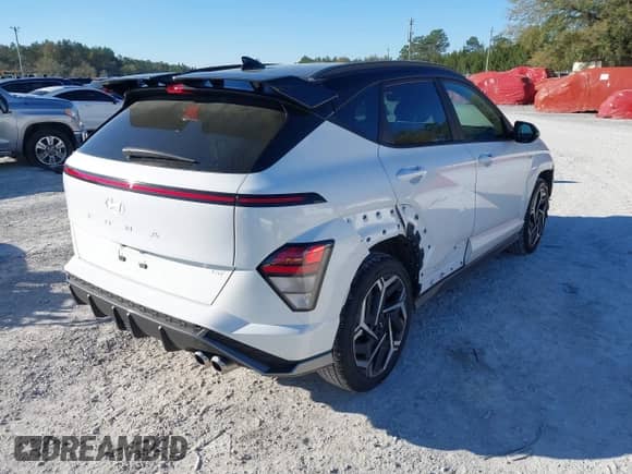2024 Hyundai Kona N Line z VIN KM8HA3A36RU162744, wystawiony jako IAAI lot #41794211 z przebiegiem 3 057 mil mil oraz . Historia ofert i sprzedaży dostępna na DreamBid. Obrazek 4.