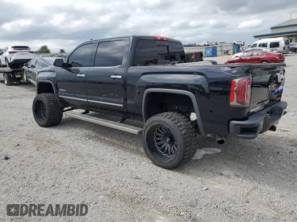 2016 GMC Sierra 1500 Denali z VIN 3GTU2PEJ7GG281449, wystawiony jako Copart lot #65558455 z przebiegiem 138 342 mil mil oraz Szkoda całkowita • Salvage title. Historia ofert i sprzedaży dostępna na DreamBid. Obrazek 2.