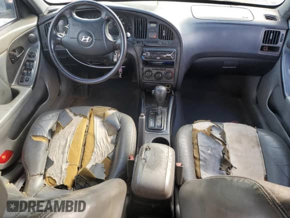 2004 Hyundai Elantra GT z VIN KMHDN56D94U110176, wystawiony jako Copart lot #64356595 z przebiegiem 343 675 mil mil oraz Nie do naprawy • Non repairable. Historia ofert i sprzedaży dostępna na DreamBid. Obrazek 8.