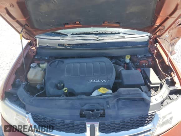 2014 Dodge Journey SXT with VIN 3C4PDCBG6ET235141, listed as a Copart auction lot 71271175 with 126,982 mi miles and Salvage title. Bid and sale history available at DreamBid. Image 12.