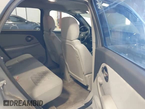 2006 Chevrolet Equinox LT z VIN 2CNDL63F666127553, wystawiony jako IAAI lot #43226031 z przebiegiem 189 355 mil mil oraz . Historia ofert i sprzedaży dostępna na DreamBid. Obrazek 8.