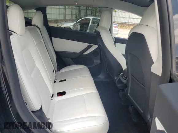 2022 Tesla Model Y Long Range with VIN 7SAYGDEE9NF455340, listed as a Copart auction lot 66966654 with 22,707 mi miles and Salvage title. Bid and sale history available at DreamBid. Image 10.