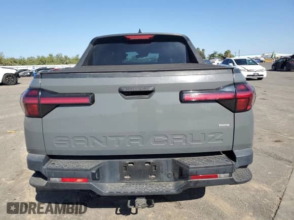 2022 Hyundai Santa Cruz SEL with VIN 5NTJBDAE8NH022419, listed as a Copart auction lot 72043705 with 38,009 mi miles and Salvage title. Bid and sale history available at DreamBid. Image 6.