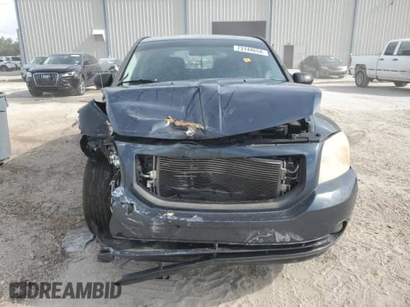 2007 Dodge Caliber SXT с VIN 1B3HB48B97D219005, выставлен на аукционе Copart как лот 73144654 с пробегом 159 146 миль миль и На запчасти • Non repairable. История ставок и продаж доступна на DreamBid. Изображение 5.