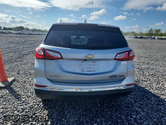 2018 Chevrolet Equinox Premier with VIN 2GNAXMEV5J6138631, listed as a Copart auction lot 81776555 with 151,906 mi miles and Salvage title. Bid and sale history available at DreamBid. Image 6.