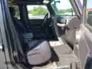 2008 Jeep Wrangler Unlimited Sahara with VIN 1J4GA59128L607591, listed as a IAAI auction lot 42959722 with 129,564 mi miles and . Bid and sale history available at DreamBid. Image 5.