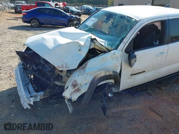 2023 Toyota Tacoma SR z VIN 3TYCZ5AN3PT159617, wystawiony jako IAAI lot #43235205 z przebiegiem Nie podano mil oraz . Historia ofert i sprzedaży dostępna na DreamBid. Obrazek 6.