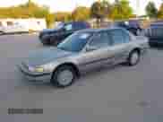 1991 Honda Accord LX z VIN JHMCB7651MC015726, wystawiony jako IAAI lot #41843620 z przebiegiem 55 563 mil mil oraz . Historia ofert i sprzedaży dostępna na DreamBid. Obrazek 2.