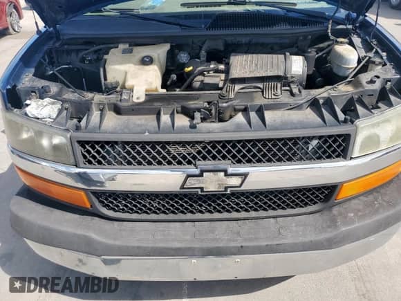 2004 Chevrolet Express Passenger with VIN 1GBFG15T041233492, listed as a Copart auction lot 82193815 with 219,338 mi miles and Salvage title. Bid and sale history available at DreamBid. Image 11.