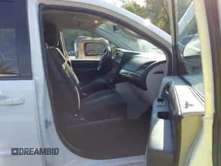 2013 Dodge Grand Caravan SE with VIN 2C4RDGBG6DR543511, listed as a IAAI auction lot 43350223 with 215,995 mi miles and . Bid and sale history available at DreamBid. Image 5.