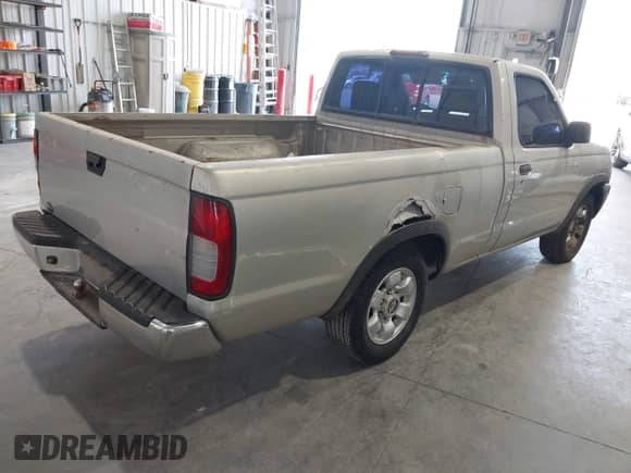 1998 Nissan Frontier XE with VIN 1N6DD21S9WC331083, listed as a IAAI auction lot 42202743 with 205,221 mi miles and . Bid and sale history available at DreamBid. Image 4.