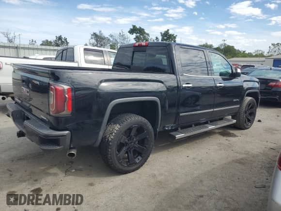 2018 GMC Sierra 1500 Denali with VIN 3GTU2PECXJG521358, listed as a Copart auction lot 70265395 with 99,289 mi miles and Salvage title. Bid and sale history available at DreamBid. Image 3.