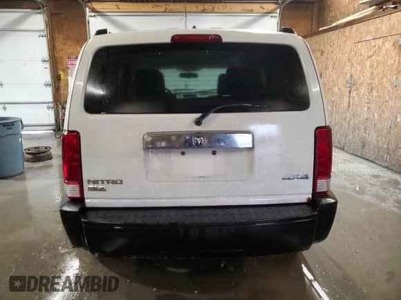 2007 Dodge Nitro SLT с VIN 1D8GU58K97W669625, выставлен на аукционе Copart как лот 79652324 с пробегом 102 954 миль миль и Списание • Salvage title. История ставок и продаж доступна на DreamBid. Изображение 6.