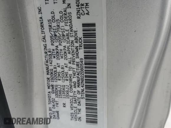 2002 Toyota Tacoma with VIN 5TENL42N82Z080549, listed as a Copart auction lot 80899715 with 115,239 mi miles and Salvage title. Bid and sale history available at DreamBid. Image 12.