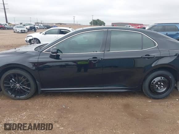 2023 Toyota Camry XSE with VIN 4T1K61AK4PU828838, listed as a IAAI auction lot 43087534 with 19,542 mi miles and . Bid and sale history available at DreamBid. Image 14.