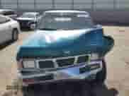 1996 Nissan Frontier XE with VIN 1N6SD11S7TC376391, listed as a Copart auction lot 58258525 with 121,702 mi miles and Salvage title. Bid and sale history available at DreamBid. Image 5.