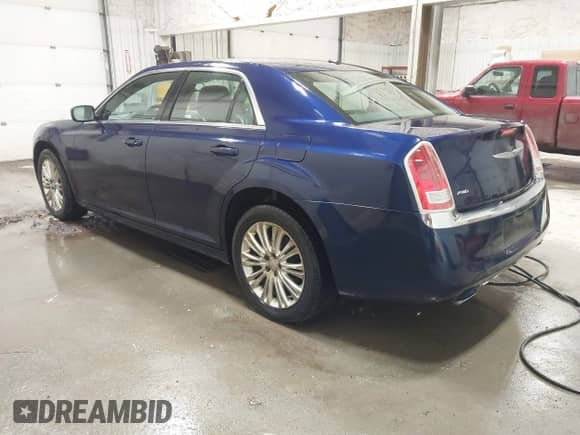 2013 Chrysler 300 with VIN 2C3CCARG9DH614125, listed as a IAAI auction lot 42227211 with 134,856 mi miles and . Bid and sale history available at DreamBid. Image 3.
