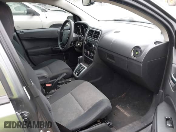 2011 Dodge Caliber Mainstreet with VIN 1B3CB3HA6BD254282, listed as a IAAI auction lot 43203478 with 73,592 mi miles and . Bid and sale history available at DreamBid. Image 5.