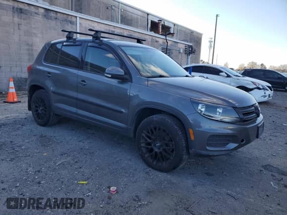 2013 Volkswagen Tiguan with VIN WVGCV3AXXDW611177, listed as a Copart auction lot 82296484 with 95,814 mi miles and Clean title. Bid and sale history available at DreamBid. Image 4.
