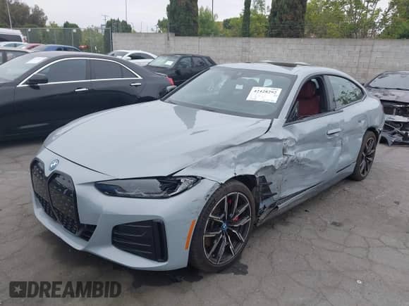 2023 BMW i4 eDrive40 with VIN WBY73AW0XPFR19237, listed as a IAAI auction lot 42428292 with 11,490 mi miles and . Bid and sale history available at DreamBid. Image 2.