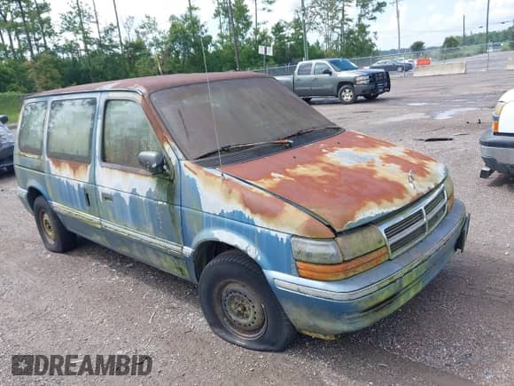 1993 Dodge Caravan with VIN 2B4GH2531PR318549, listed as a IAAI auction lot 43032590 with 245,192 mi miles and . Bid and sale history available at DreamBid. Image 1.