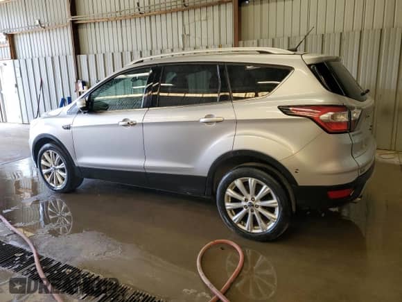 2017 Ford Escape Titanium with VIN 1FMCU9J95HUA02877, listed as a Copart auction lot 81366515 with 166,622 mi miles and Clean title. Bid and sale history available at DreamBid. Image 2.