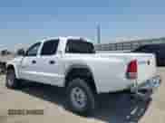 2000 Dodge Dakota Sport with VIN 1B7GG2AN8YS598547, listed as a Copart auction lot 54520985 with 244,605 mi miles and Salvage title. Bid and sale history available at DreamBid. Image 2.