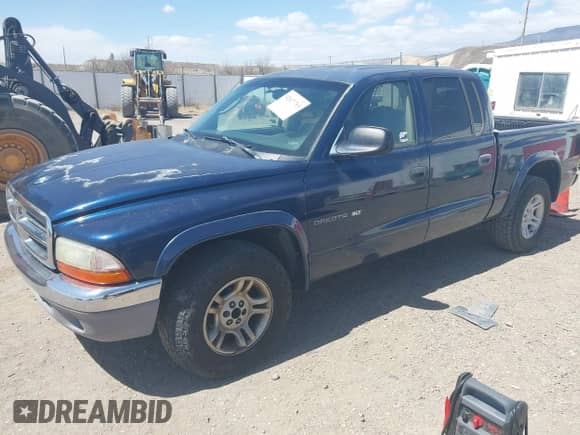2002 Dodge Dakota SLT с VIN 1B7HL48N32S708719, выставлен на аукционе IAAI как лот 42027763 с пробегом 217 797 миль миль и . История ставок и продаж доступна на DreamBid. Изображение 2.