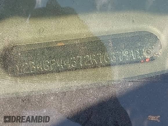2002 Dodge Caravan Sport with VIN 2B4GP44372R763791, listed as a IAAI auction lot 42878590 with Not provided miles and . Bid and sale history available at DreamBid. Image 11.