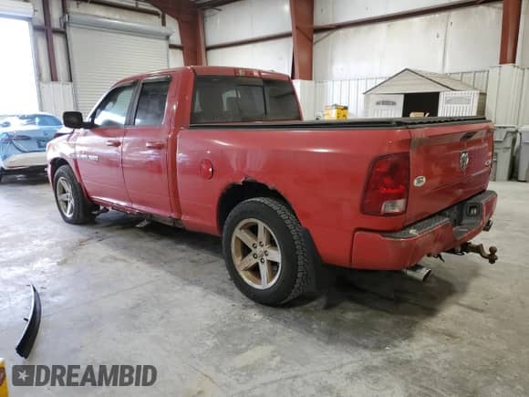 2011 Ram 1500 Big Horn with VIN 1D7RV1GT3BS552619, listed as a Copart auction lot 90519715 with 103,410 mi miles and Salvage title. Bid and sale history available at DreamBid. Image 2.